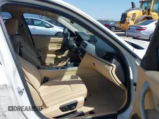2012 BMW 3 Series 328i with VIN WBA3A5C51CF349987, listed as a IAAI auction lot 42013599 with 256,461 mi miles. Bid and sale history available at carsss.com. Image 5.