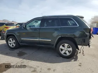 2011 Jeep Grand Cherokee Laredo with VIN 1J4RR4GG2BC636423, listed as a Copart auction lot 51169135 with 143,058 mi miles and Salvage Title. Bid and sale history available at DreamBid. Image 2.