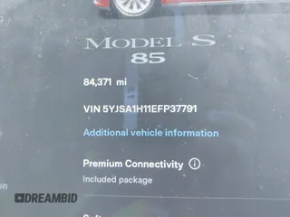 2014 Tesla Model S 60 with VIN 5YJSA1H11EFP37791, listed as a IAAI auction lot 41995504 with 84,371 mi miles and . Bid and sale history available at DreamBid. Image 7.