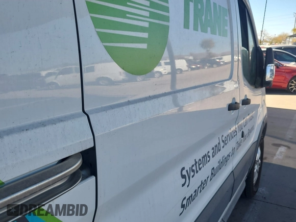 2018 Ford Transit with VIN 1FTYR1YG2JKB43974, listed as a IAAI auction lot 41852638 with 104,713 mi miles and . Bid and sale history available at DreamBid. Image 1.