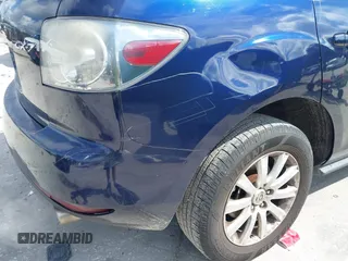 2010 Mazda CX-7 Sport with VIN JM3ER2W5XA0301457, listed as a IAAI auction lot 42257772 with 229,697 mi miles and . Bid and sale history available at DreamBid. Image 12.