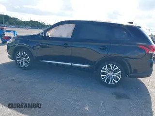 2018 Mitsubishi Outlander SE with VIN JA4AD3A33JZ055813, listed as a IAAI auction lot 41232885 with 126,457 mi miles and . Bid and sale history available at DreamBid. Image 3.