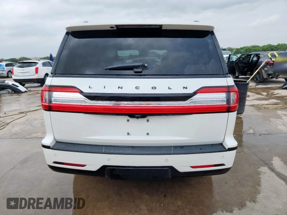 2020 Lincoln Navigator Reserve with VIN 5LMJJ2LTXLEL01023, listed as a Copart auction lot 57403185 with 116,215 mi miles and Salvage title. Bid and sale history available at DreamBid. Image 6.