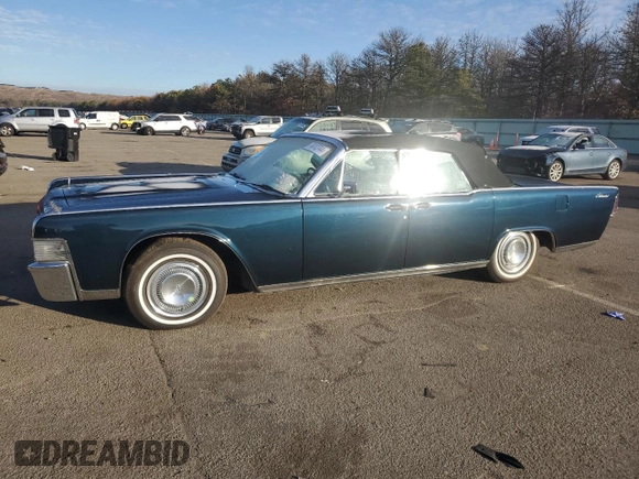 1965 Lincoln Continental with VIN 5Y86N428064, listed as a Copart auction lot 76812744 with 15,659 mi miles and Salvage Title. Bid and sale history available at DreamBid. Image 1.