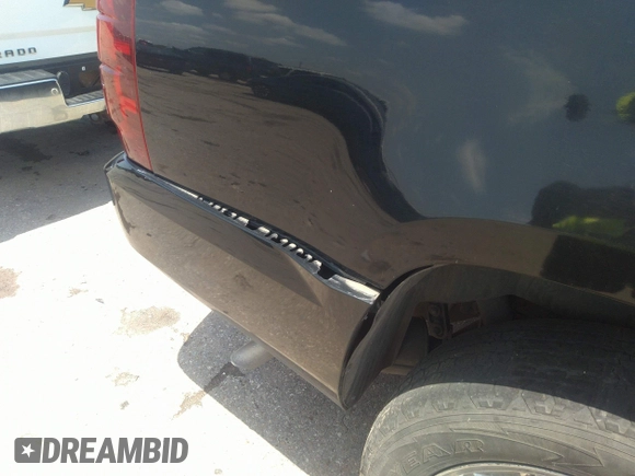 2013 Chevrolet Suburban LT with VIN 1GNSCJE05DR142688, listed as a IAAI auction lot 42214548 with 236,464 mi miles and . Bid and sale history available at DreamBid. Image 6.
