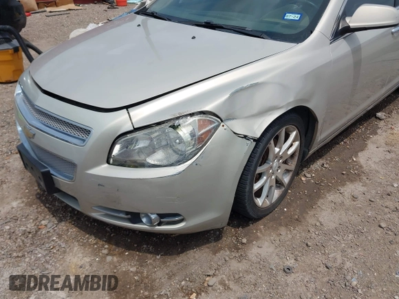 2012 Chevrolet Malibu LTZ with VIN 1G1ZG5E75CF273189, listed as a IAAI auction lot 42065802 with 153,869 mi miles and . Bid and sale history available at DreamBid. Image 6.