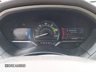 2015 Lincoln MKZ Hybrid with VIN 3LN6L2LU2FR607310, listed as a IAAI auction lot 42115513 with 80,418 mi miles and . Bid and sale history available at DreamBid. Image 7.