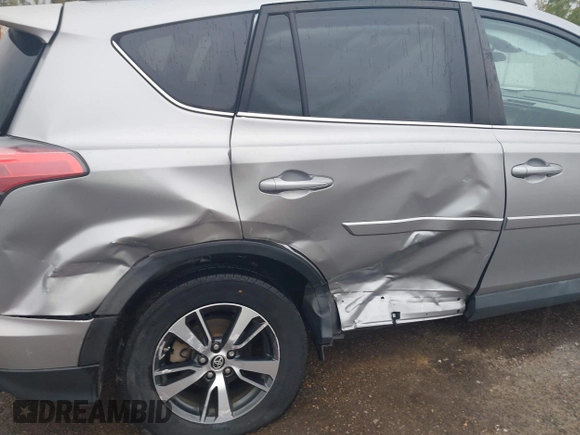 2018 Toyota RAV4 XLE with VIN 2T3WFREV3JW445654, listed as a IAAI auction lot 40849666 with 69,365 mi miles and . Bid and sale history available at DreamBid. Image 6.