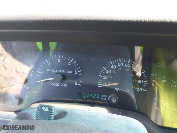 1999 Jeep Cherokee Sport with VIN 1J4FF68S8XL673655, listed as a IAAI auction lot 40981087 with 152,328 mi miles. Bid and sale history available at carsss.com. Image 7.