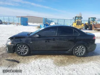 2017 Mitsubishi Lancer ES with VIN JA32U2FU2HU009837, listed as a IAAI auction lot 41302170 with 99,727 mi miles. Bid and sale history available at carsss.com. Image 14.