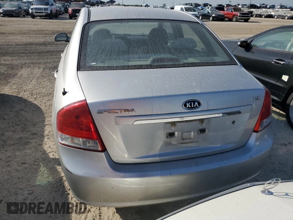 2009 Kia Spectra EX with VIN KNAFE221X95631249, listed as a Copart auction lot 75119304 with 193,338 mi miles and Salvage Title. Bid and sale history available at carsss.com. Image 6.