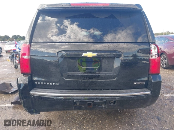 2018 Chevrolet Suburban Premier with VIN 1GNSCJKC2JR199702, listed as a IAAI auction lot 41136128 with 80,103 mi miles and . Bid and sale history available at DreamBid. Image 15.