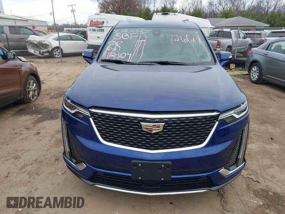 2023 Cadillac XT6 AWD Premium Luxury with VIN 1GYKPDRS2PZ126666, listed as a IAAI auction lot 40963833 with 23,535 mi miles and . Bid and sale history available at DreamBid. Image 13.