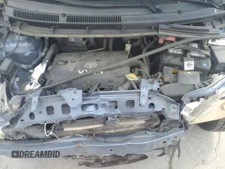 2009 Toyota Yaris with VIN JTDBT903191331207, listed as a Copart auction lot 54570165 with 232,601 mi miles and Salvage Title. Bid and sale history available at DreamBid. Image 11.