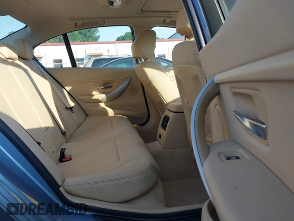 2012 BMW 3 Series 328i with VIN WBA3A5C50CF346823, listed as a IAAI auction lot 42161682 with 76,729 mi miles and . Bid and sale history available at carsss.com. Image 8.