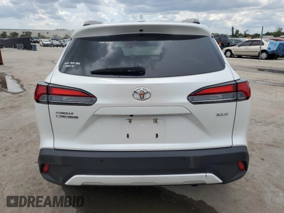 2023 Toyota Corolla Cross XLE z VIN 7MUDAAAG7PV051492, wystawiony jako Copart lot #61185635 z przebiegiem 79 364 mil mil oraz Nie do naprawy • Non repairable. Historia ofert i sprzedaży dostępna na DreamBid. Obrazek 6.