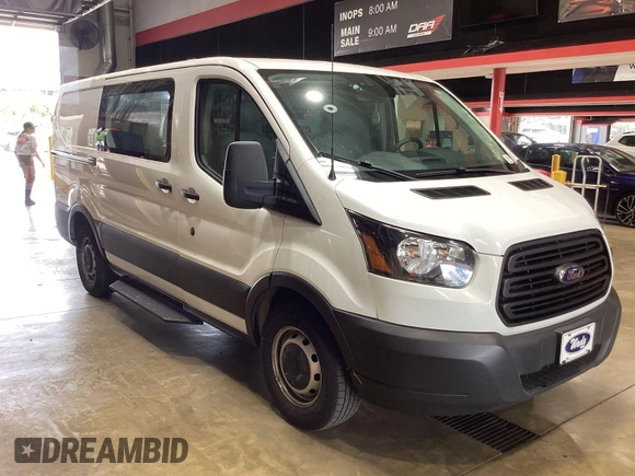 2019 Ford Transit with VIN 1FTYE1YM6KKB31880, listed as a IAAI auction lot 42792031 with 99,943 mi miles and . Bid and sale history available at DreamBid. Image 3.