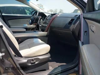 2015 Mazda CX-9 Grand Touring with VIN JM3TB3DA0F0459024, listed as a IAAI auction lot 42452288 with 174,716 mi miles and . Bid and sale history available at DreamBid. Image 5.