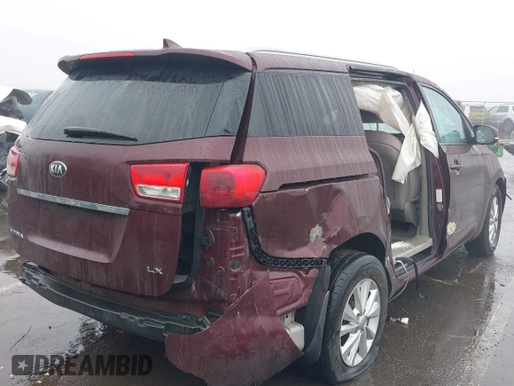 2016 Kia Sedona LX with VIN KNDMB5C17G6144987, listed as a IAAI auction lot 41569757 with 164,539 mi miles. Bid and sale history available at carsss.com. Image 4.