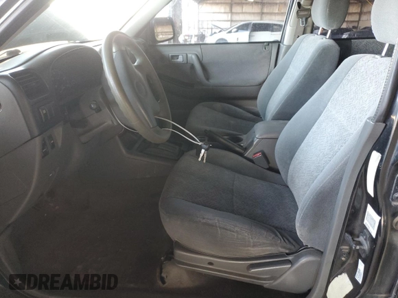 2002 Isuzu Rodeo S with VIN 4S2CK58WX24309147, listed as a Copart auction lot 44266155 with 73,935 mi miles and Salvage Title. Bid and sale history available at DreamBid. Image 7.