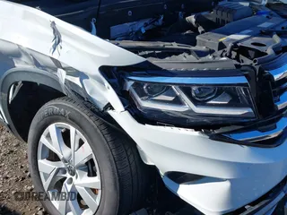2021 Volkswagen Atlas S with VIN 1V2AC2CA2MC234168, listed as a IAAI auction lot 40842265 with 27,765 mi miles and . Bid and sale history available at DreamBid. Image 6.