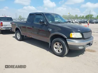 2002 Ford F-150 XL z VIN 1FTRX18L82NA18808, wystawiony jako IAAI lot #42259883 z przebiegiem 154 519 mil mil oraz . Historia ofert i sprzedaży dostępna na DreamBid. Obrazek 1.