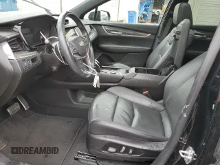 2021 Cadillac XT5 AWD Sport z VIN 1GYKNGRS3MZ158562, wystawiony jako Copart lot #43593295 z przebiegiem 32 293 mil mil oraz Szkoda całkowita • Salvage title. Historia ofert i sprzedaży dostępna na DreamBid. Obrazek 7.