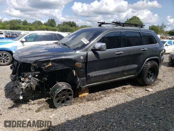 2011 Jeep Grand Cherokee Limited with VIN 1J4RR5GT2BC677640, listed as a Copart auction lot 68012754 with 138,208 mi miles and Salvage title. Bid and sale history available at DreamBid. Image 1.