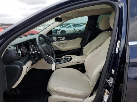2017 Mercedes-Benz E 300 Luxury with VIN WDDZF4KB2HA128313, listed as a Copart auction lot 54372285 with 60,484 mi miles and Salvage title. Bid and sale history available at DreamBid. Image 7.