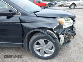 2011 Honda CR-V LX with VIN 5J6RE4H34BL099237, listed as a IAAI auction lot 41966339 with 135,744 mi miles. Bid and sale history available at carsss.com. Image 6.