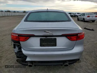 2016 Jaguar XF with VIN SAJBL4BV6GCY16964, listed as a Copart auction lot 82786584 with 100,587 mi miles and Salvage Title. Bid and sale history available at DreamBid. Image 6.