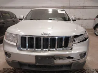 2011 Jeep Grand Cherokee Laredo with VIN 1J4RR4GG5BC690251, listed as a IAAI auction lot 41824839 with 261,010 mi miles. Bid and sale history available at carsss.com. Image 12.
