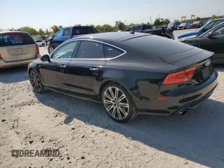 2015 Audi A7 3.0 Prestige with VIN WAU2GAFCXFN009065, listed as a Copart auction lot 72945554 with 127,690 mi miles and Salvage Title. Bid and sale history available at carsss.com. Image 2.