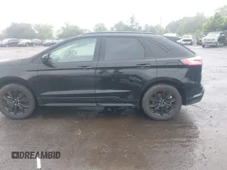 2022 Ford Edge SE z VIN 2FMPK4G94NBA99279, wystawiony jako IAAI lot #42351490 z przebiegiem 30 044 mil mil oraz . Historia ofert i sprzedaży dostępna na DreamBid. Obrazek 14.