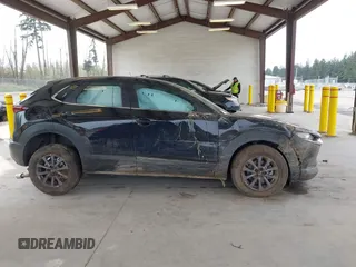 2024 Mazda CX-30 2.5 S with VIN 3MVDMBAM5RM633007, listed as a IAAI auction lot 42014511 with 11,895 mi miles. Bid and sale history available at carsss.com. Image 13.