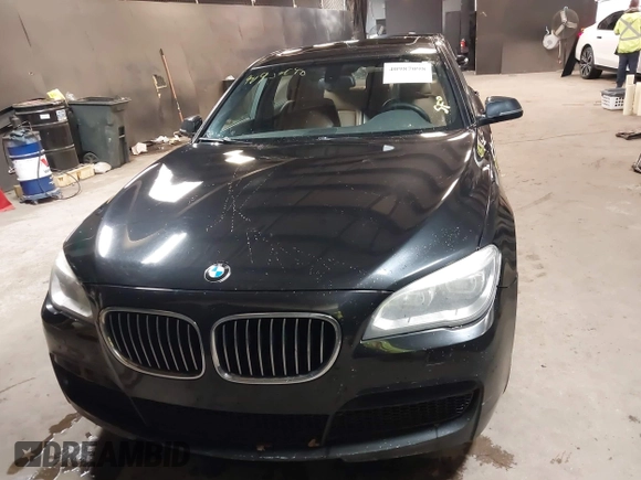 2014 BMW 7 Series ALPINA B7 xDrive with VIN WBAYF8C53ED141858, listed as a IAAI auction lot 40987098 with 128,404 mi miles and . Bid and sale history available at DreamBid. Image 12.