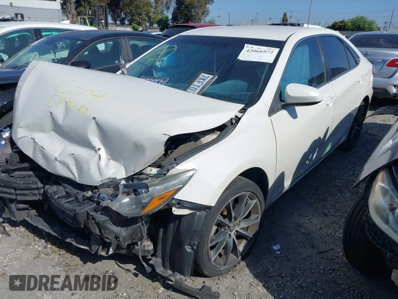 2015 Toyota Camry XLE with VIN 4T1BF1FK3FU913743, listed as a IAAI auction lot 42066972 with 136,917 mi miles and . Bid and sale history available at DreamBid. Image 18.