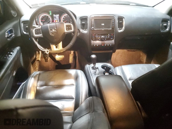 2013 Dodge Durango Crew with VIN 1C4SDJDT8DC509541, listed as a Copart auction lot 54063395 with 145,471 mi miles and Salvage title. Bid and sale history available at DreamBid. Image 8.