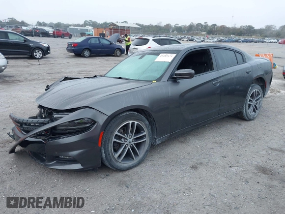 2019 Dodge Charger SXT with VIN 2C3CDXJG1KH730489, listed as a IAAI auction lot 41189171 with 39,514 mi miles and . Bid and sale history available at DreamBid. Image 17.