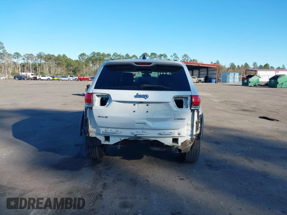 2017 Jeep Grand Cherokee Laredo with VIN 1C4RJFAG7HC688625, listed as a IAAI auction lot 41295860 with 115,714 mi miles. Bid and sale history available at carsss.com. Image 16.