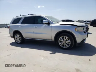 2013 Dodge Durango Crew with VIN 1C4SDHDTXDC552531, listed as a Copart auction lot 50353595 with 181,386 mi miles and Salvage title. Bid and sale history available at DreamBid. Image 4.