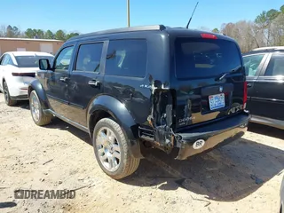 2011 Dodge Nitro Heat with VIN 1D4PU4GX7BW565927, listed as a IAAI auction lot 41803129 with 84,980 mi miles. Bid and sale history available at carsss.com. Image 3.