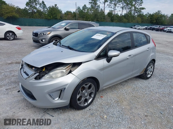 2011 Ford Fiesta SES with VIN 3FADP4FJ5BM232264, listed as a IAAI auction lot 40982622 with 184,726 mi miles. Bid and sale history available at carsss.com. Image 2.
