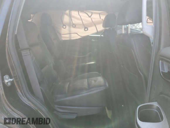 2015 Chevrolet Tahoe LTZ z VIN 1GNSKCKC4FR626030, wystawiony jako Copart lot #56280805 z przebiegiem Nie podano mil oraz Szkoda całkowita • Salvage title. Historia ofert i sprzedaży dostępna na DreamBid. Obrazek 10.