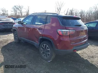 2020 Jeep Compass Trailhawk with VIN 3C4NJDDB2LT239384, listed as a IAAI auction lot 41527372 with 56,122 mi miles and . Bid and sale history available at carsss.com. Image 3.