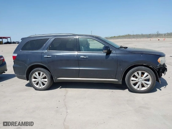 2013 Dodge Durango Crew with VIN 1C4SDHDT5DC637535, listed as a IAAI auction lot 41867982 with 162,569 mi miles. Bid and sale history available at carsss.com. Image 13.