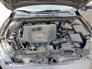 2014 Mazda 3 i Touring z VIN 3MZBM1V76EM112344, wystawiony jako Copart lot #57168785 z przebiegiem 122 826 mil mil oraz Szkoda całkowita • Salvage title. Historia ofert i sprzedaży dostępna na DreamBid. Obrazek 11.