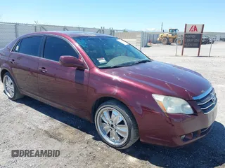 2006 Toyota Avalon XL with VIN 4T1BK36B36U087385, listed as a IAAI auction lot 41986866 with 128,594 mi miles. Bid and sale history available at carsss.com. Image 1.