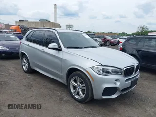 2018 BMW X5 xDrive35i z VIN 5UXKR0C5XJ0Y00343, wystawiony jako IAAI lot #42368337 z przebiegiem 52 101 mil mil oraz . Historia ofert i sprzedaży dostępna na DreamBid. Obrazek 1.