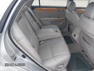 2007 Toyota Avalon XL with VIN 4T1BK36B47U191188, listed as a IAAI auction lot 42127335 with 213,701 mi miles. Bid and sale history available at carsss.com. Image 8.